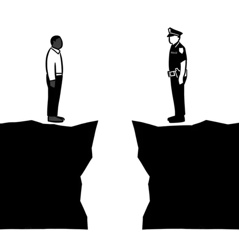 Black-and-white illustration of a man in a white shirt and a uniformed police officer facing each other from the edges of two cliffs separated by a deep gap.